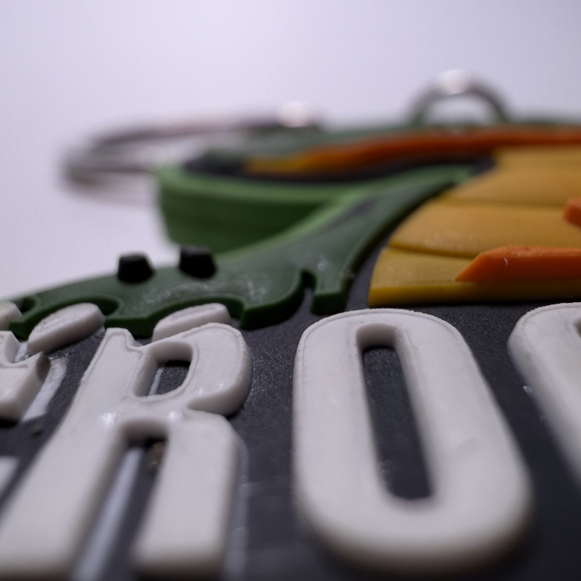 Détail d'un écusson PVC personnalisé